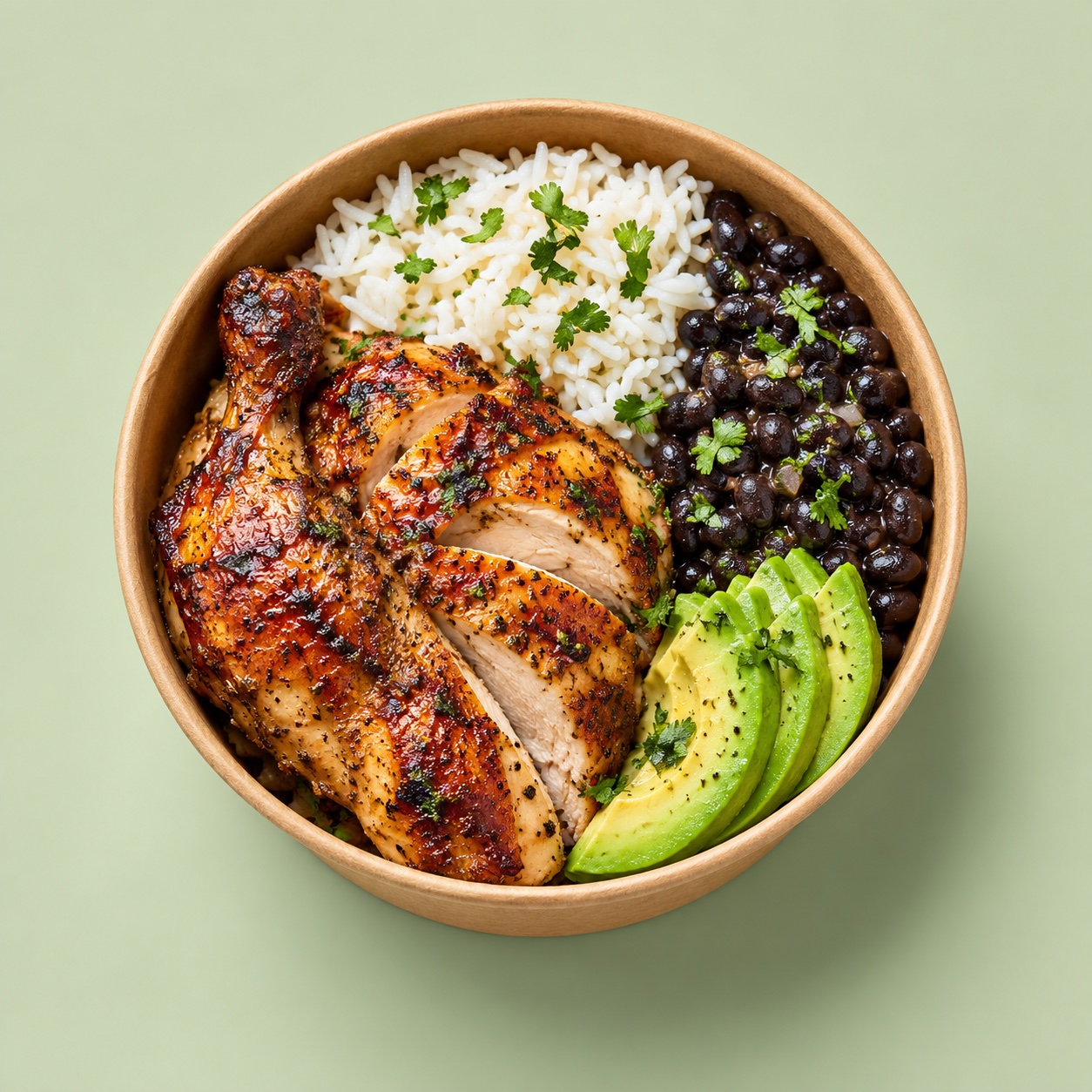 An individual Peruvian chicken bowl